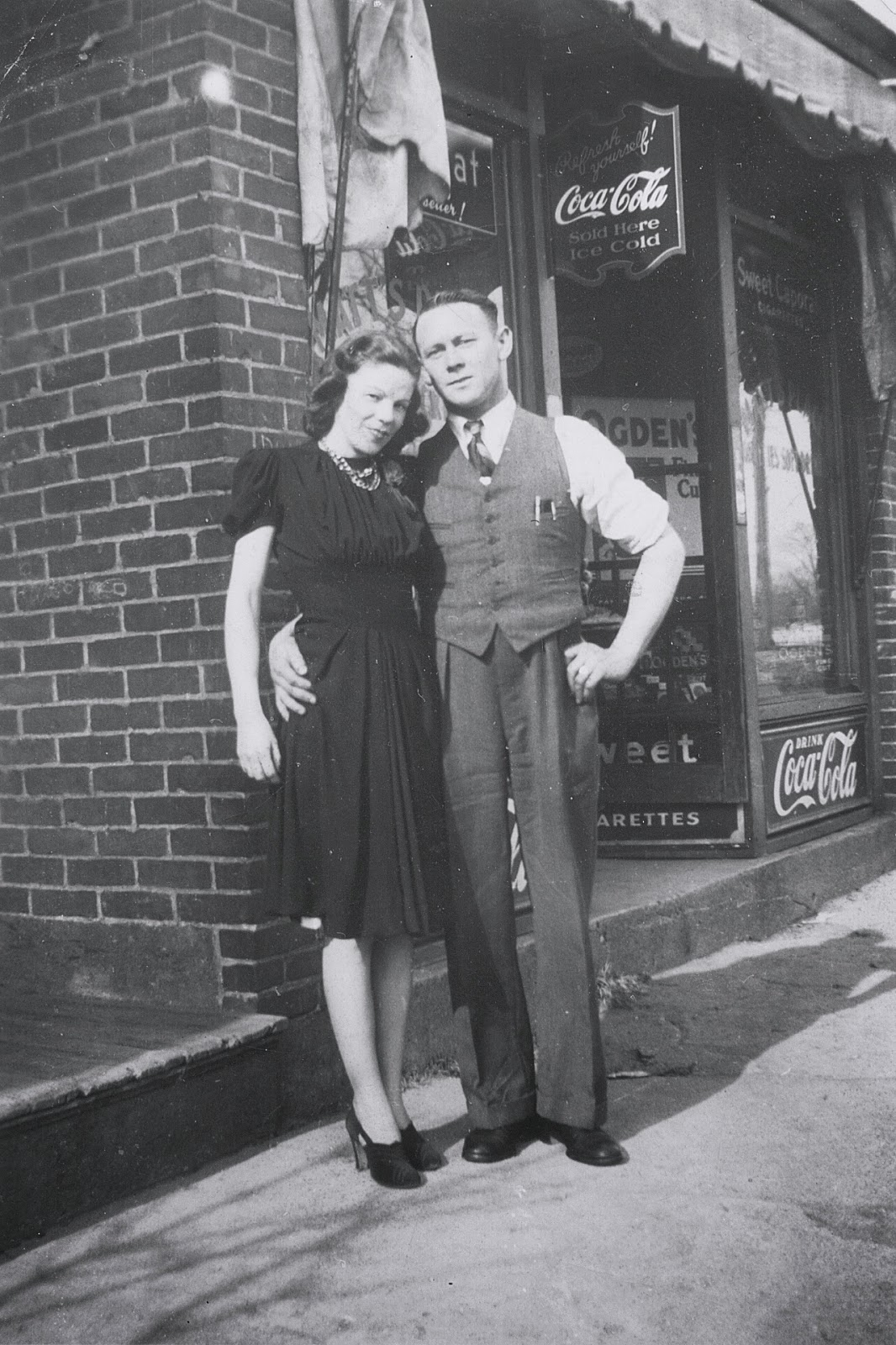Daniel and Fleur-Ange Larkin in front of the store, circa late-1930s. This photo gives the best view of the full front window of the store.